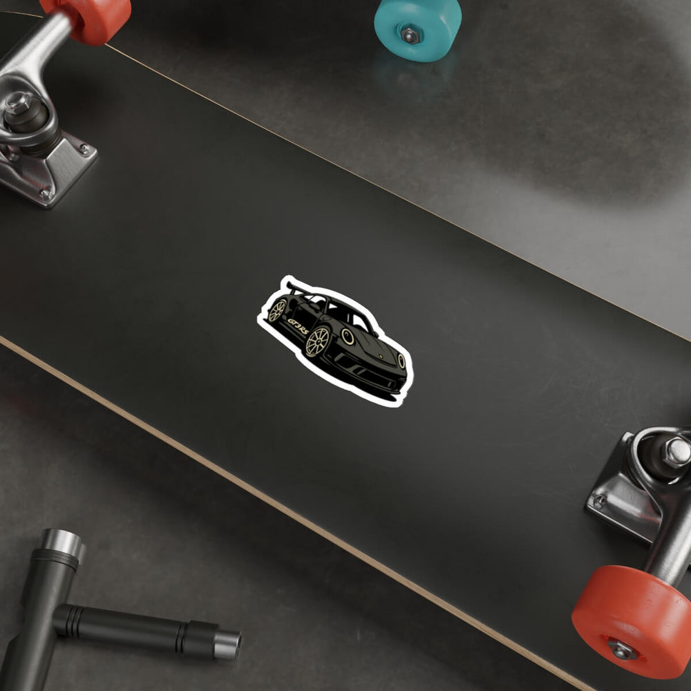 Stylized black sports car vinyl sticker inspired by luxury European track cars, placed on a laptop surface for aesthetic decoration. porsche gt3 rs