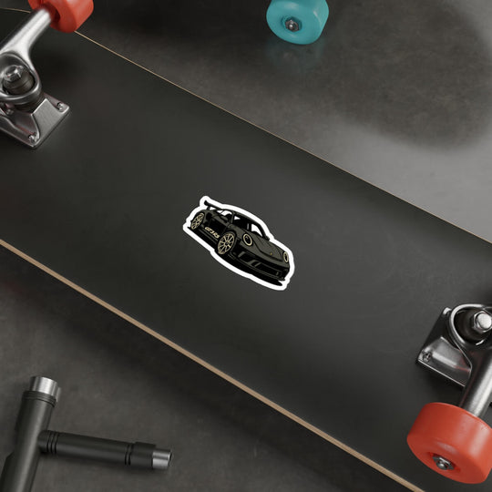 Stylized black sports car vinyl sticker inspired by luxury European track cars, placed on a laptop surface for aesthetic decoration. porsche gt3 rs