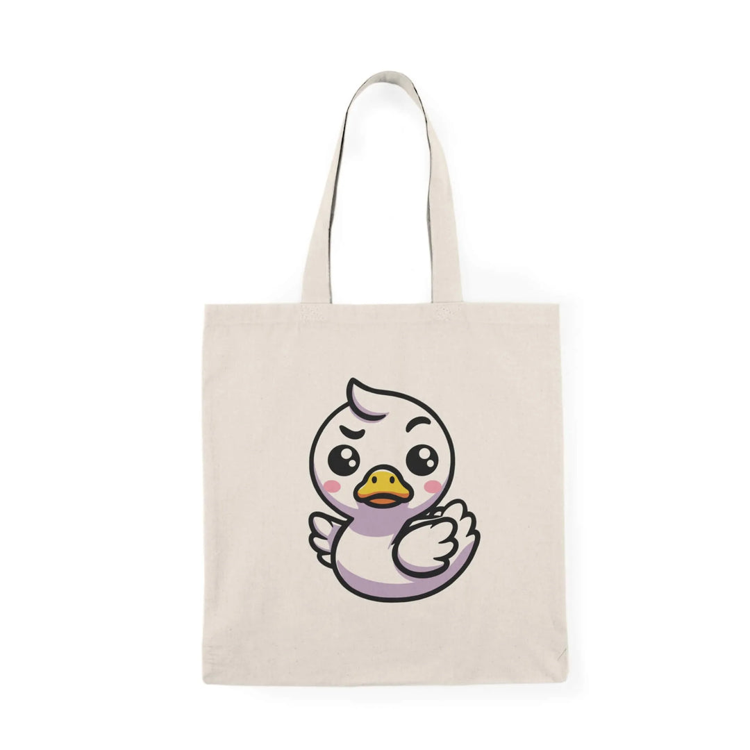 A natural cotton tote bag featuring a feisty and adorable white duck illustration with a determined expression. Perfect for everyday use and eco-friendly shopping.

