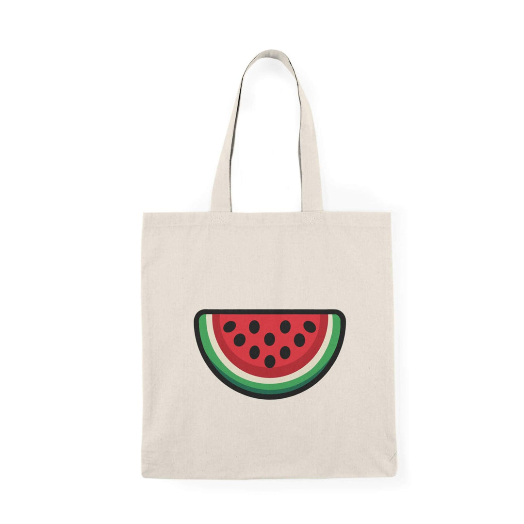 Watermelon tote bag featuring a vibrant, cartoon-style watermelon slice design with red flesh, black seeds, and green rind. Made of 100% recycled cotton.

