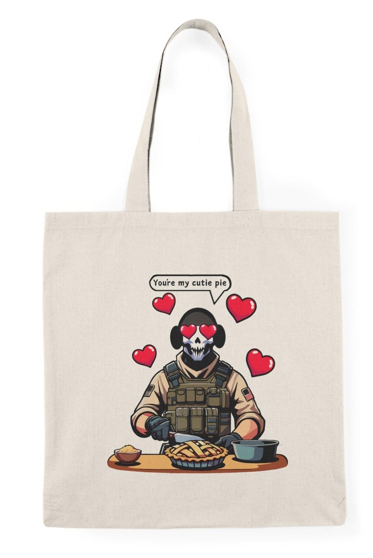 Tote bag featuring a playful illustration of a fearless soldier baking an apple pie, accompanied by the affectionate phrase 'You're My Cutie Pie.' The design combines elements of charm and humor, making it a perfect accessory for expressing love and sweetness in everyday life